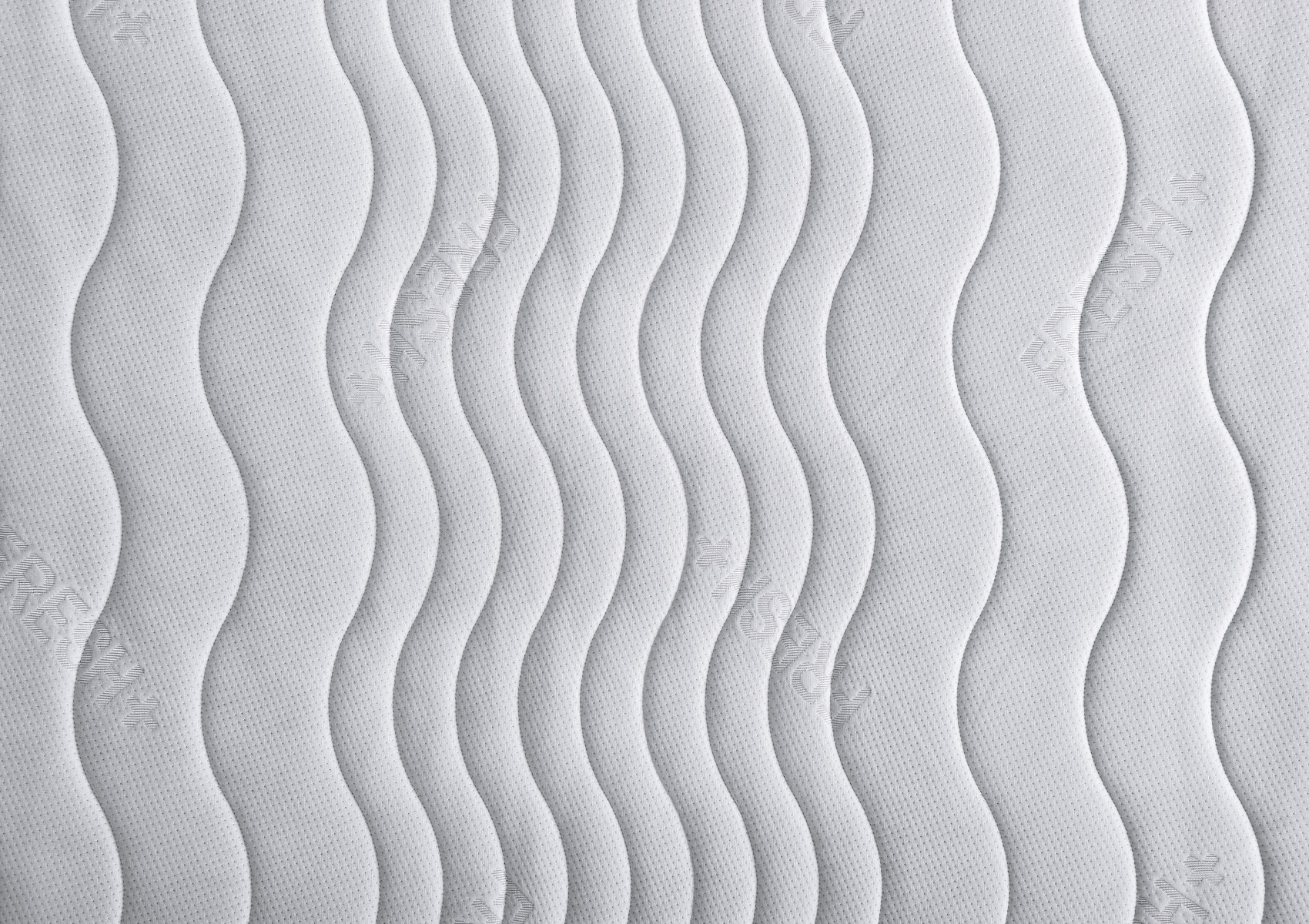 Detailaufnahme mit Fresh+ Logoprägung und dem Steppmuster in Wellenform